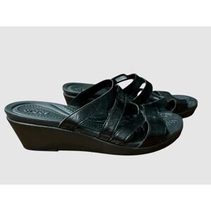 Crocs women’s 8 black strappy wedge sandals slip on.
